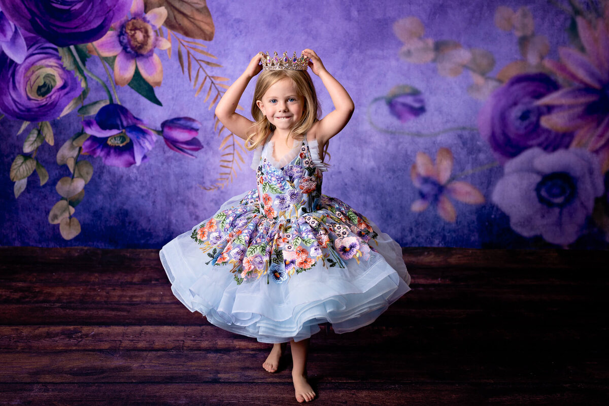 Girl dances in Bentley and Lace dress in Prescott kids photography by Melissa Byrne