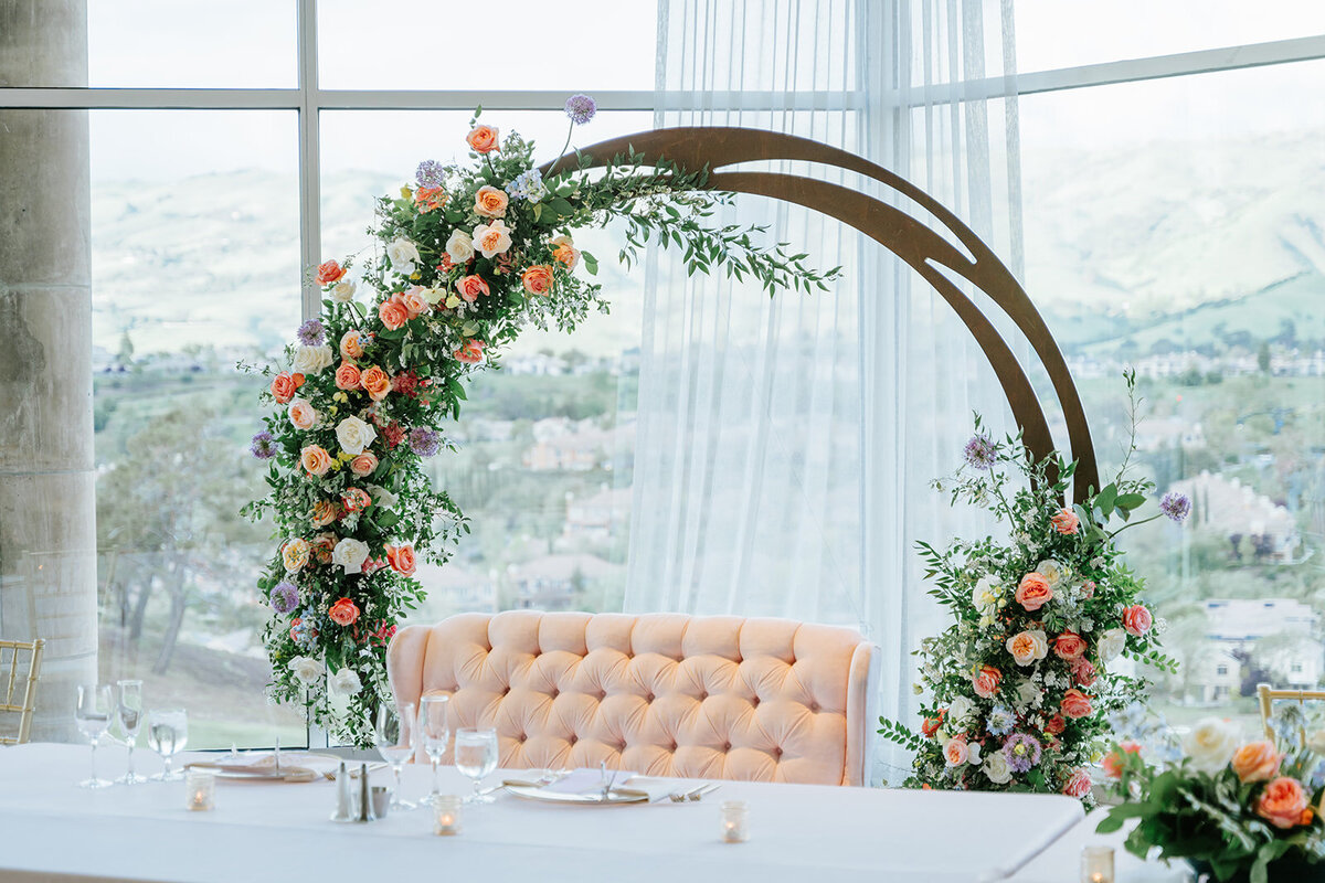 pink-loveseat-with-circle-arch
