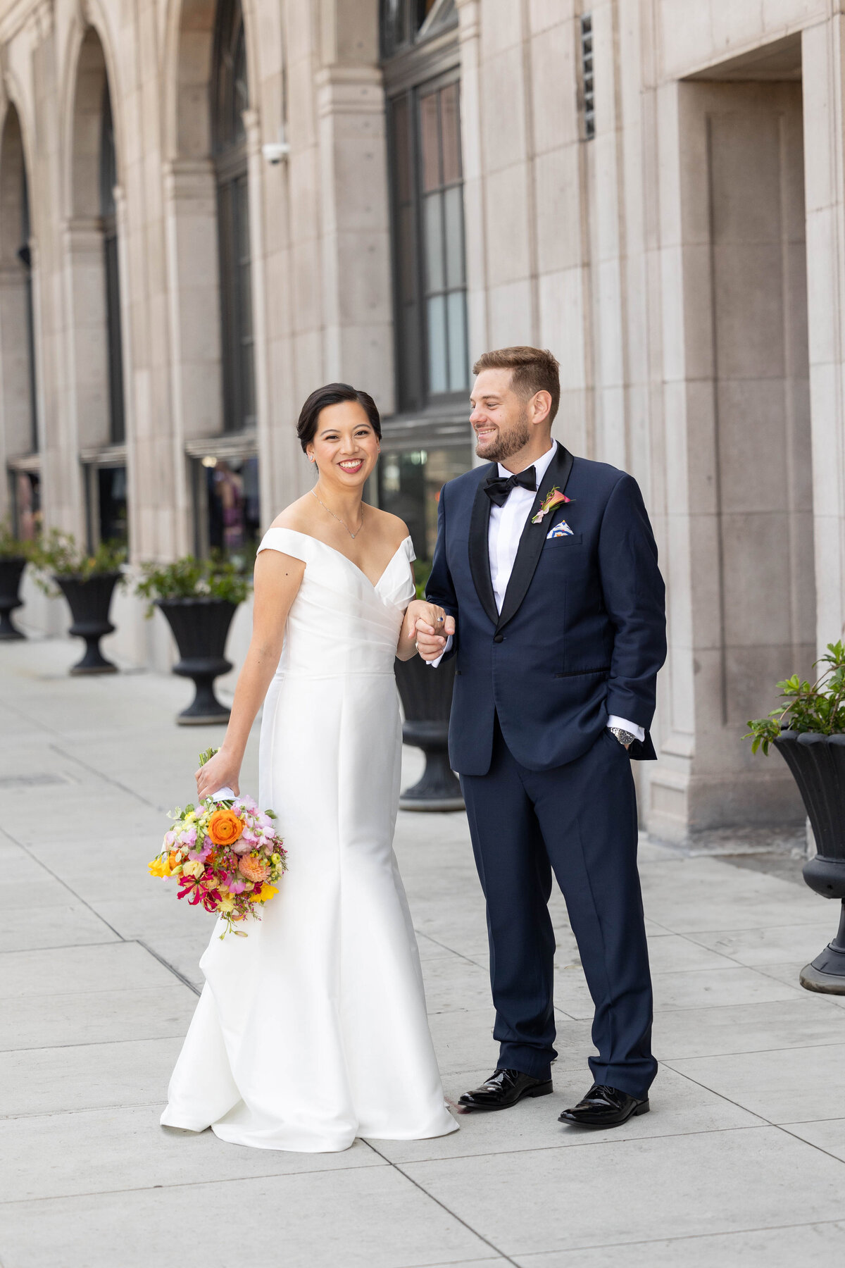 Bride and groom smiling