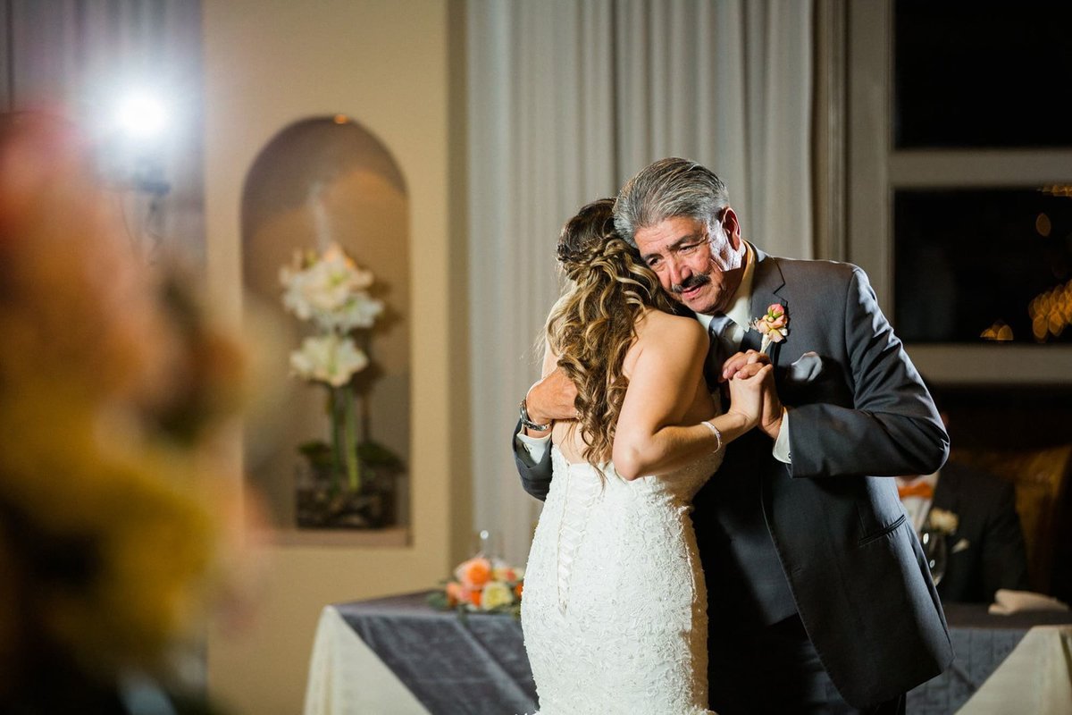 Bride dance with her father during her reception