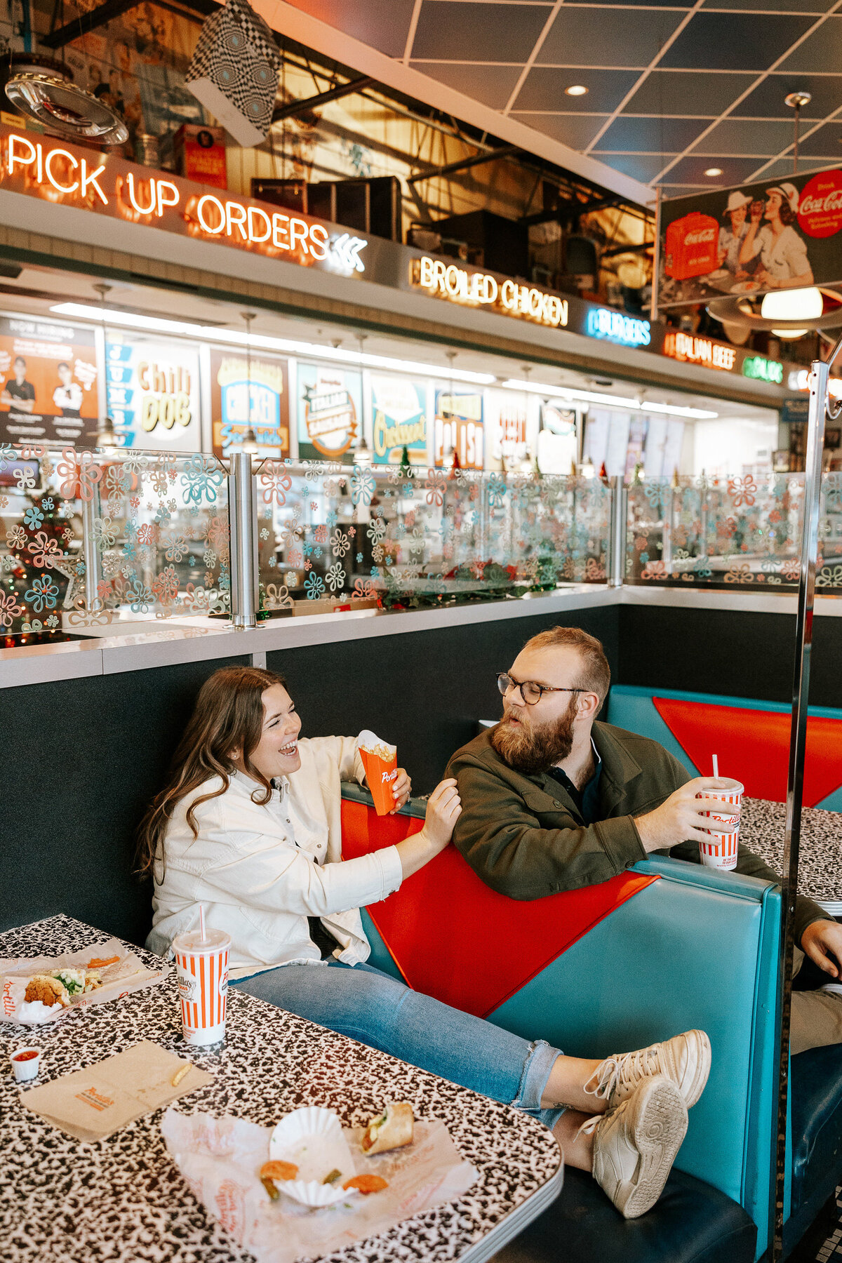 creative fun chicago flash engagement photos at Portillos Hotdogs-34-ed-lucy