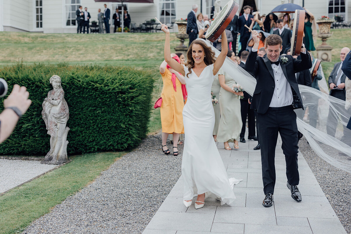 bride-and-groom-heading-for-dinner-with-guests