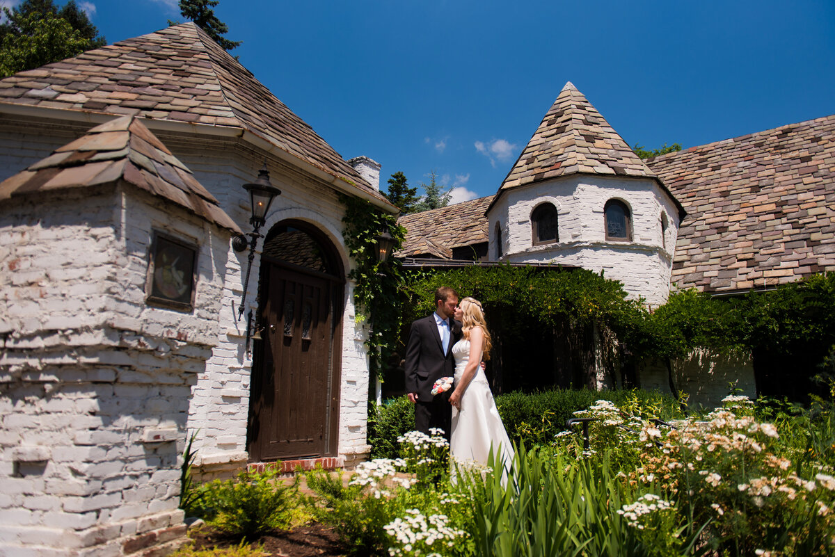 couple in front of the Hyeholde restaurant building magical fairytale
