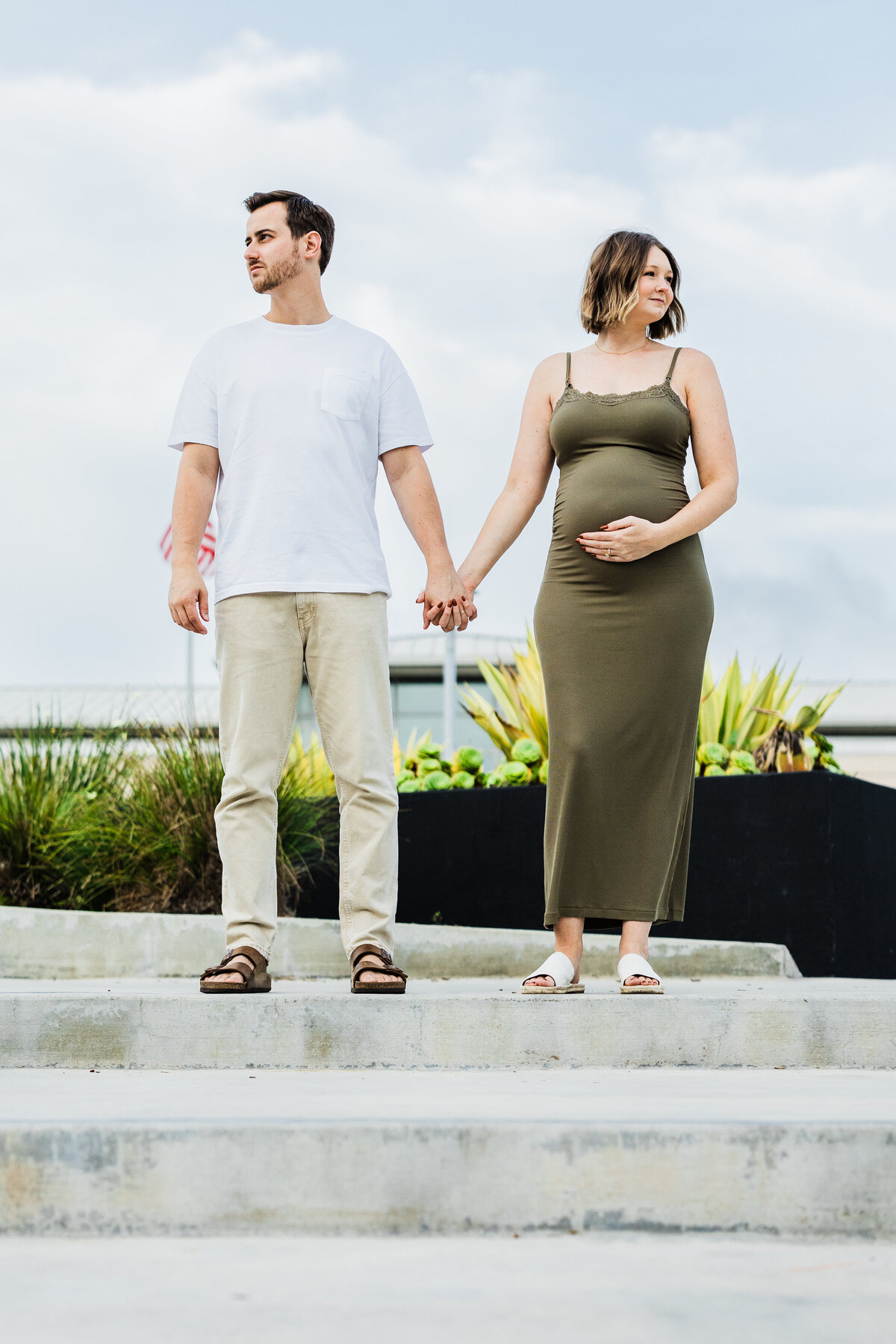 maternity-couple-portrait-in-front-of-Manhattan-Beach-police-station