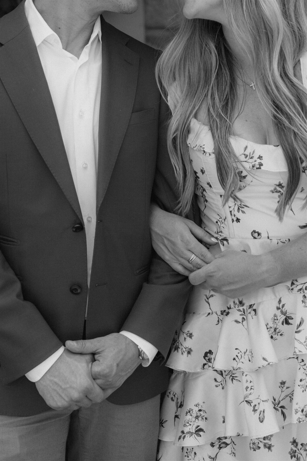 Black and White Couple Linking Arms