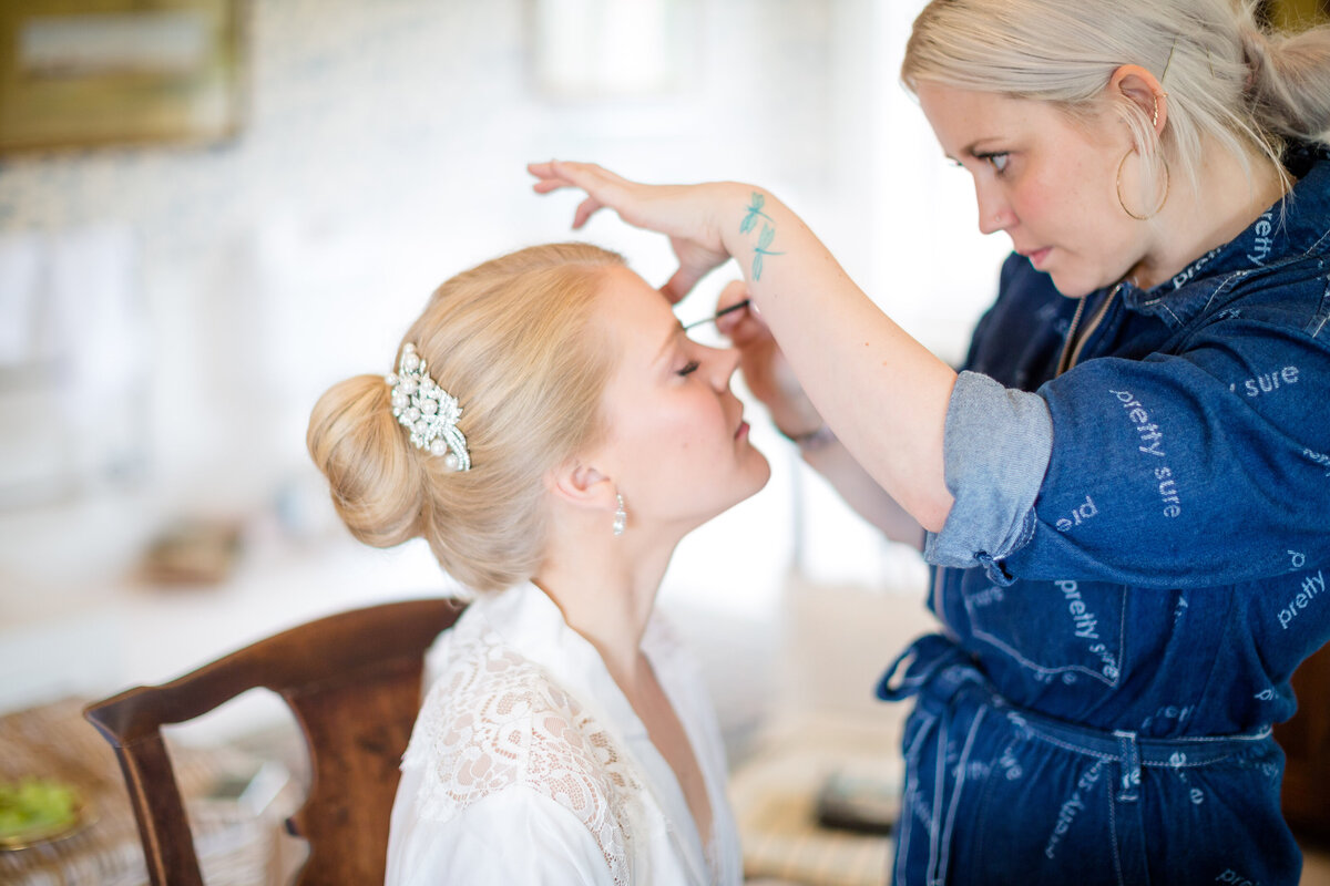 The Bride has her make up applied