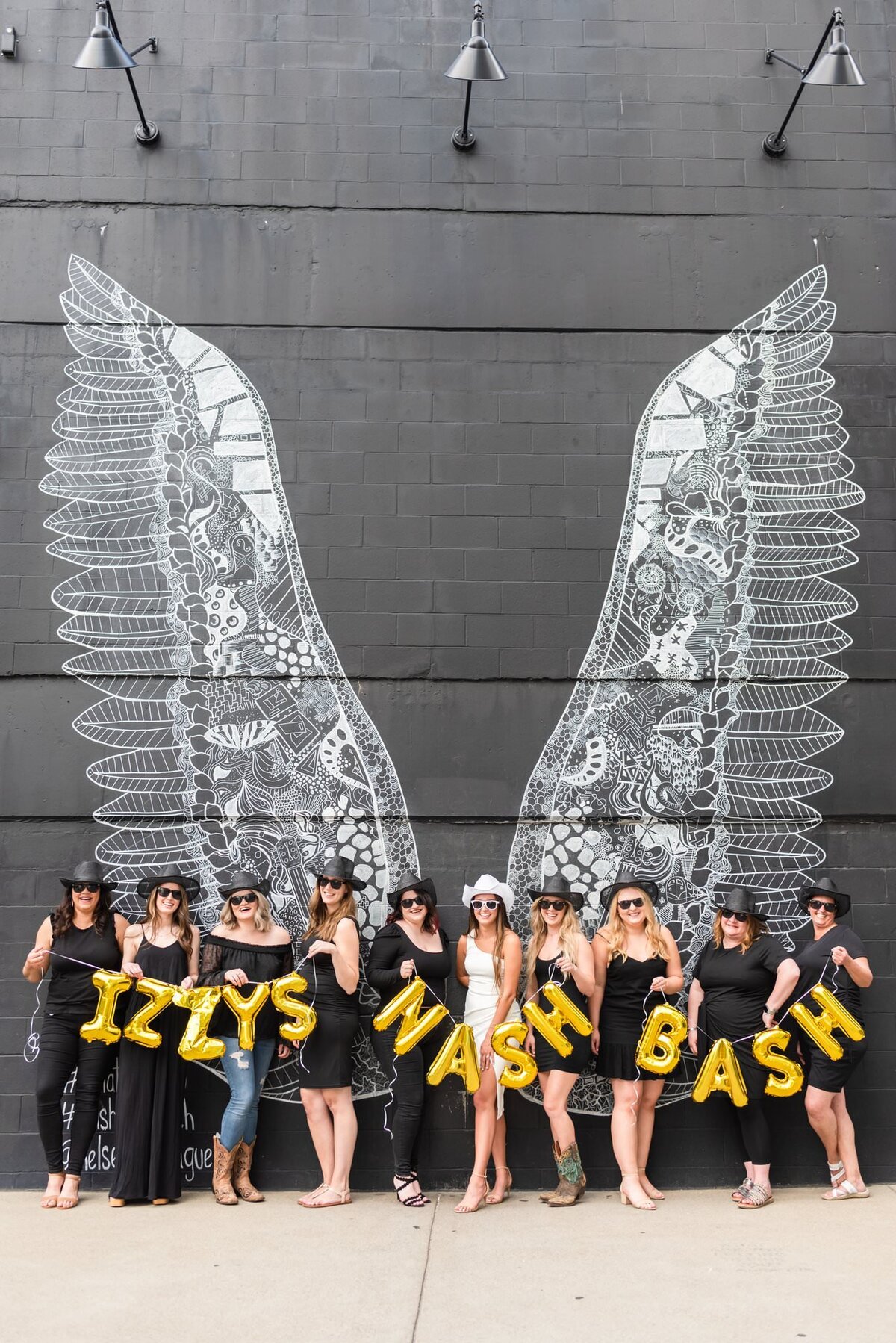 Nashville-Bachelorette-Photoshoot-What-Lifts-You-Wings-Mural-in-the-Gulch+1