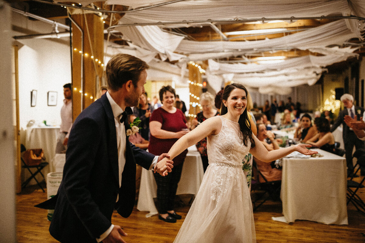 bride-and-groom-heading-to-dance-floor