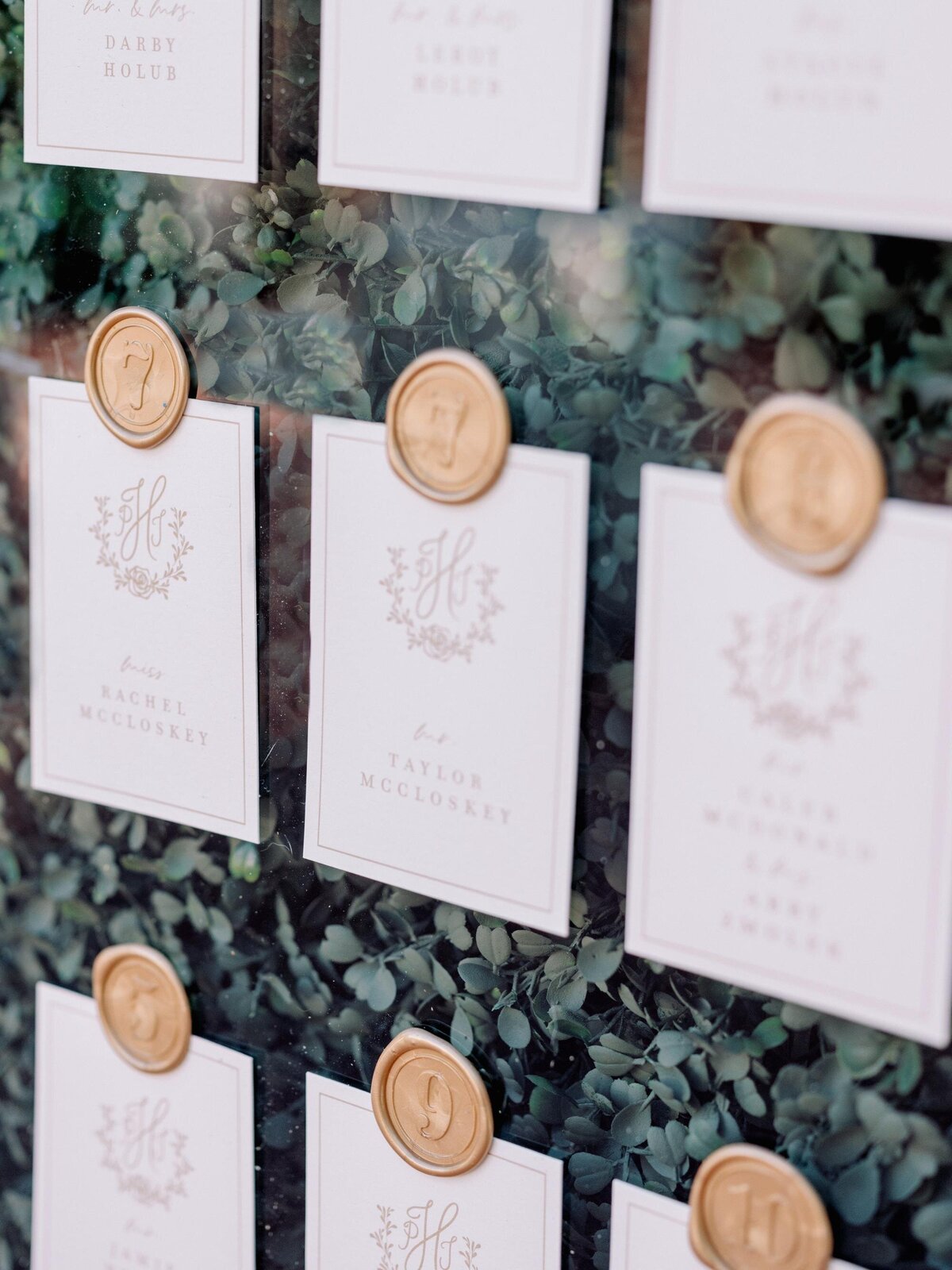 gold-wax-seal-wedidng-escort-cards