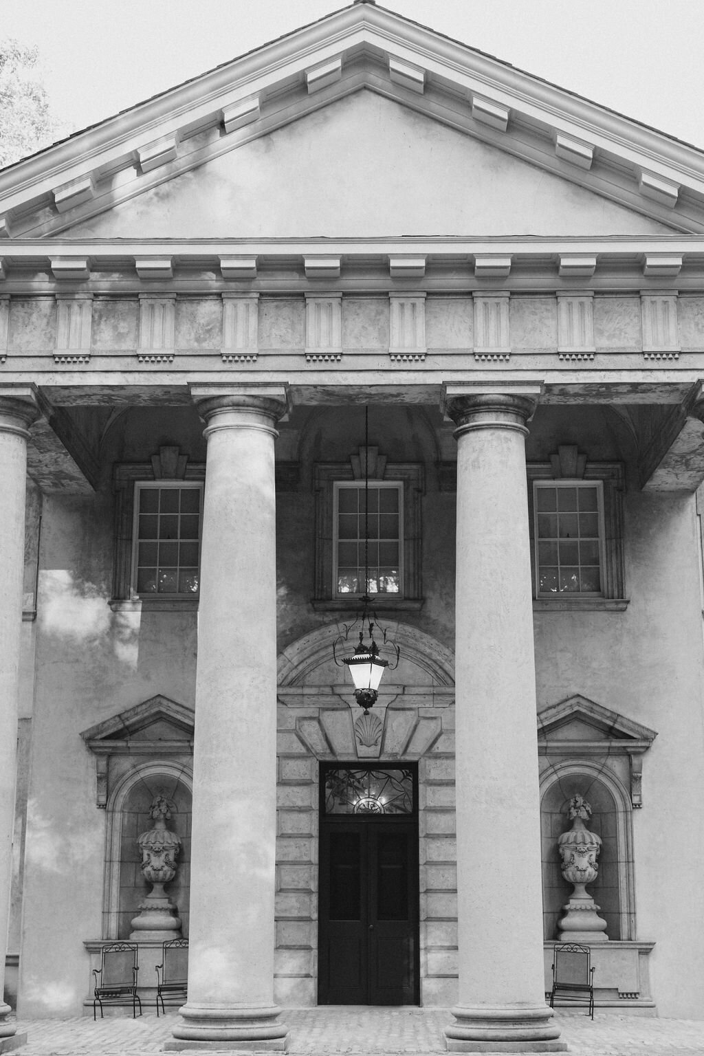 Front view of the Swan House with concrete columns and European architecture