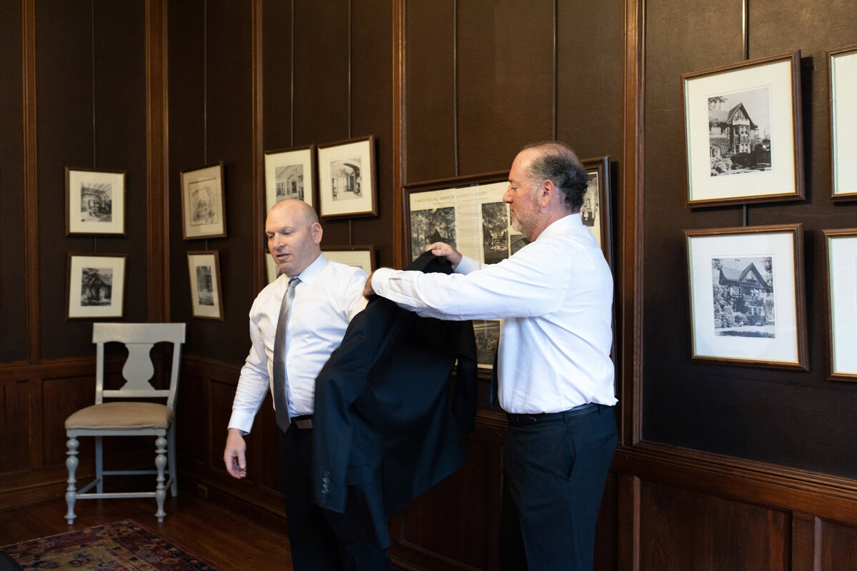 groom-getting-dressed-callanwolde-wedding-atlanta-prep-room