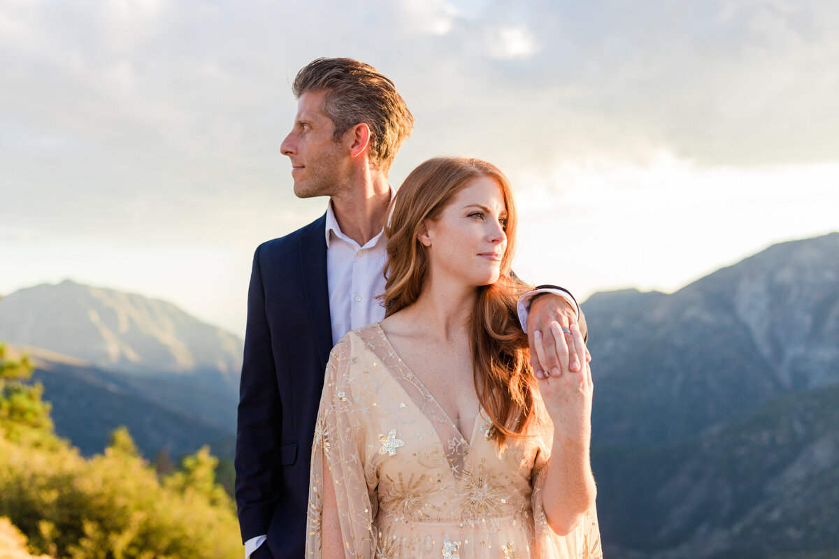 bride and groom looking in opposite directions