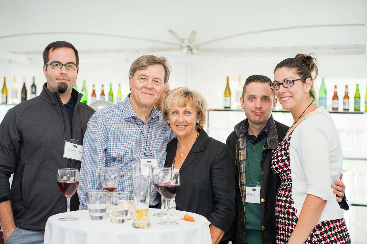 a photo of 5 smiling guests at Ell-Rod 25th Anniversary Celebration. Captured by Ottawa Event Photographer JEMMAN Photography COMMERCIAL   
