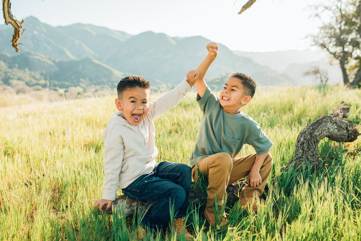 Family Portrait Photo Of Two Boys Shouting While Playing Los Angeles