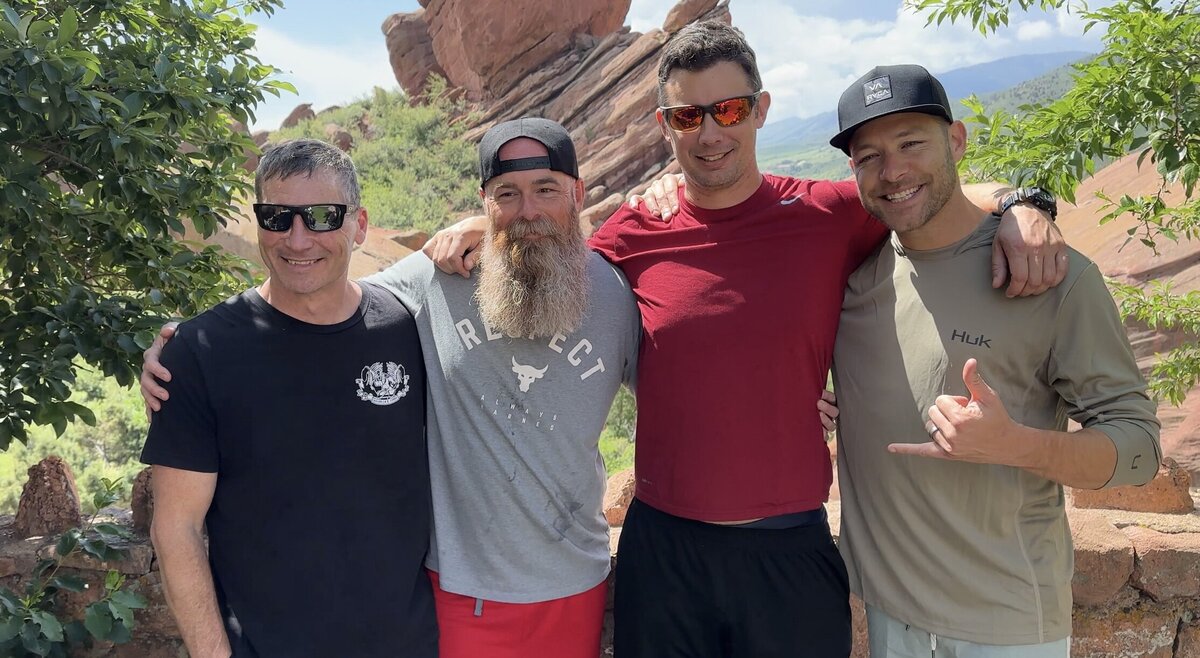 men hiking retreat