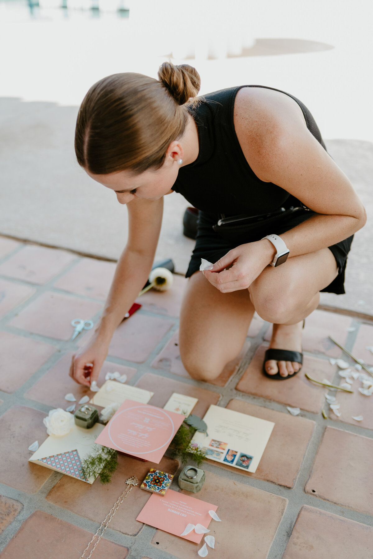 photographer creating a flatlay at wedding