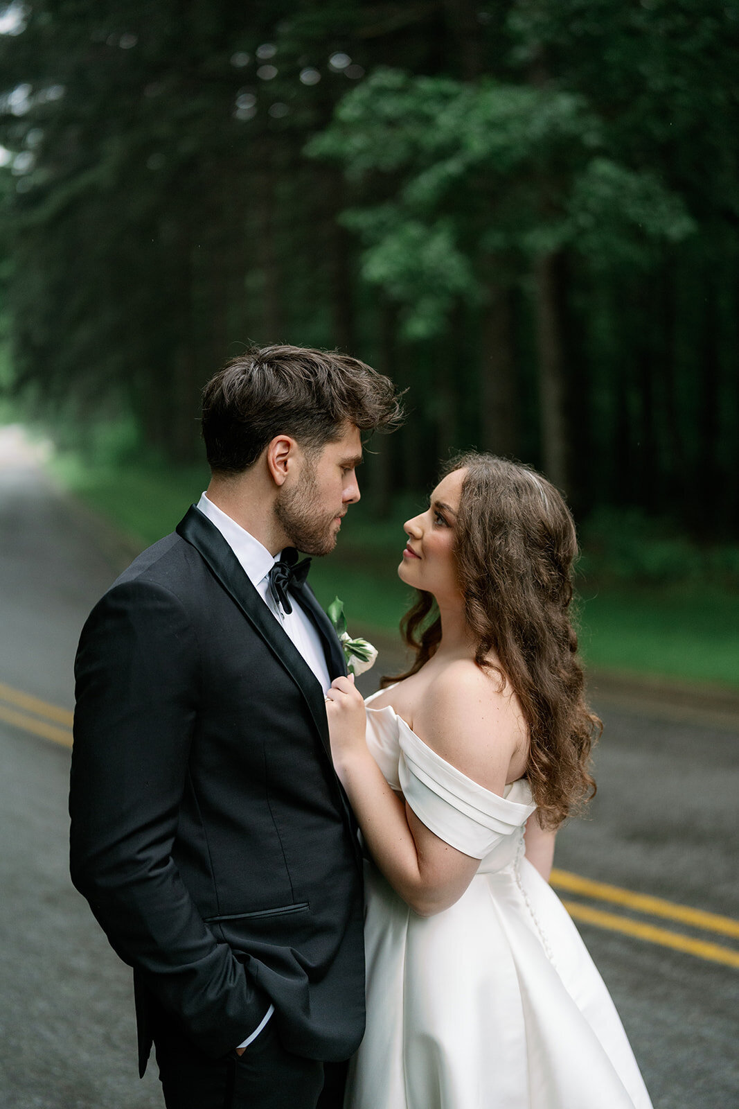 Romantic outdoor portrait of bride and groom surrounded by greenery at The Morris Estate in Niles Michigan.