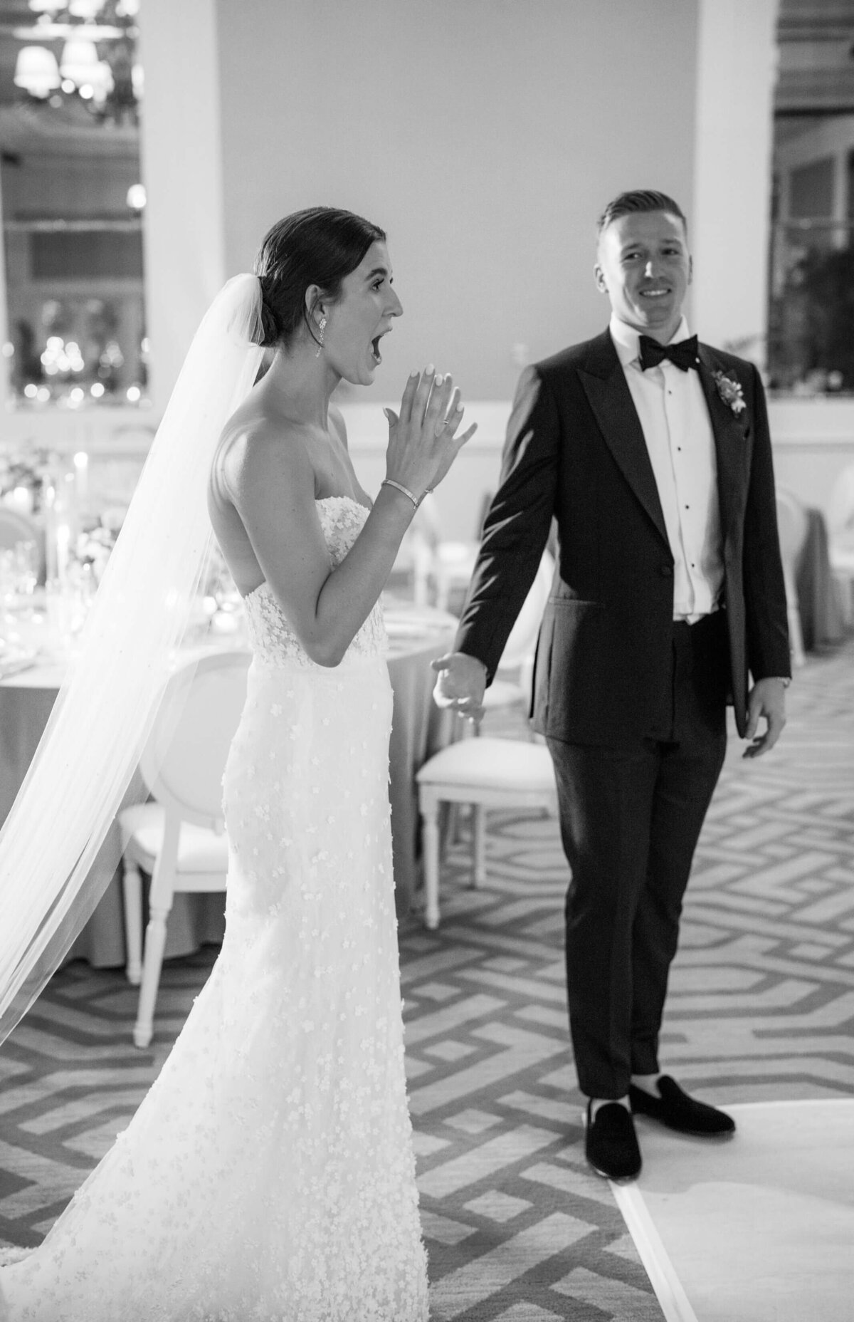 Bride and groom seeing their wedding reception for the first time