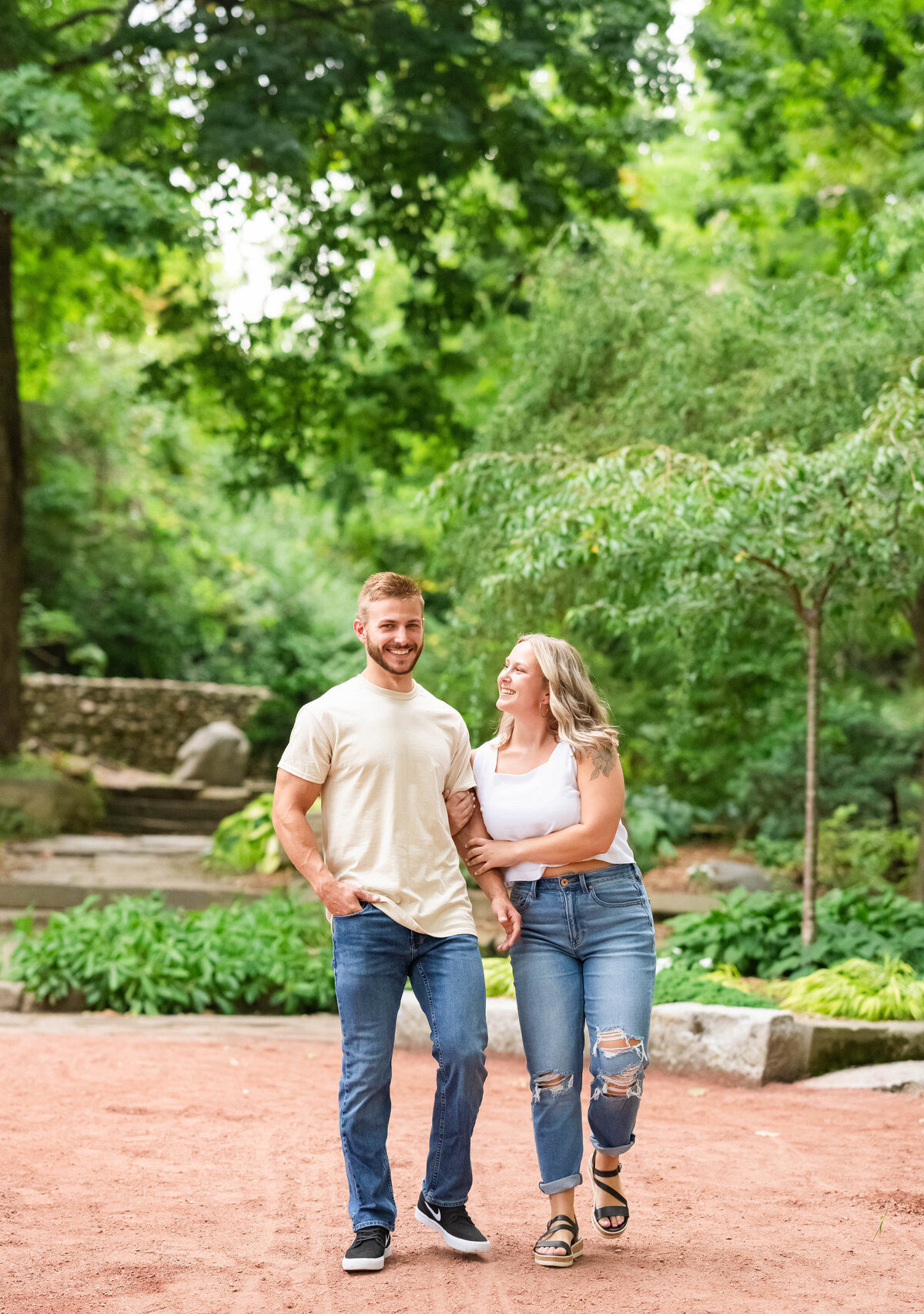 woman and man engaged walking