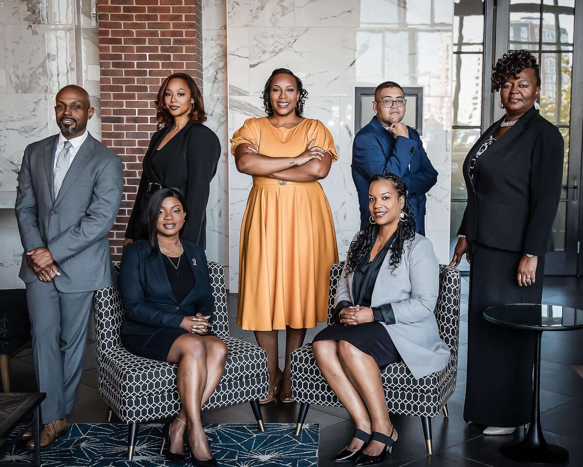 Professional corporate group photography by D3D Photography showcasing business team in modern office  setting with executive portraits