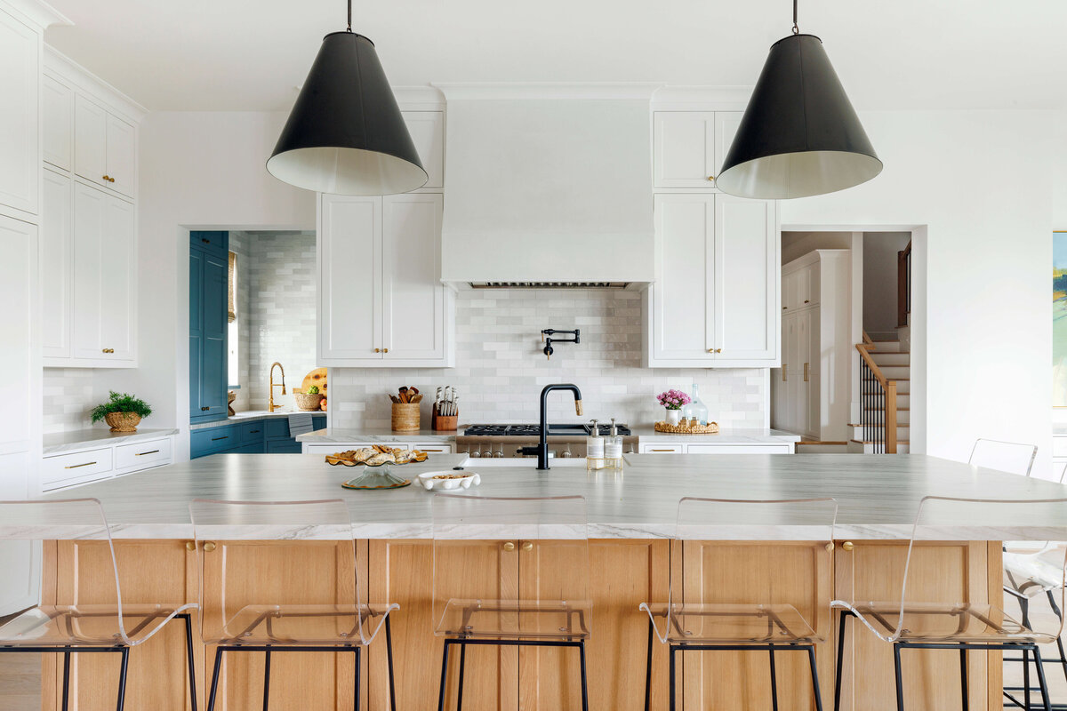 oyster creek studios missouri city new build wooden cabinets with marble counters in kitchen