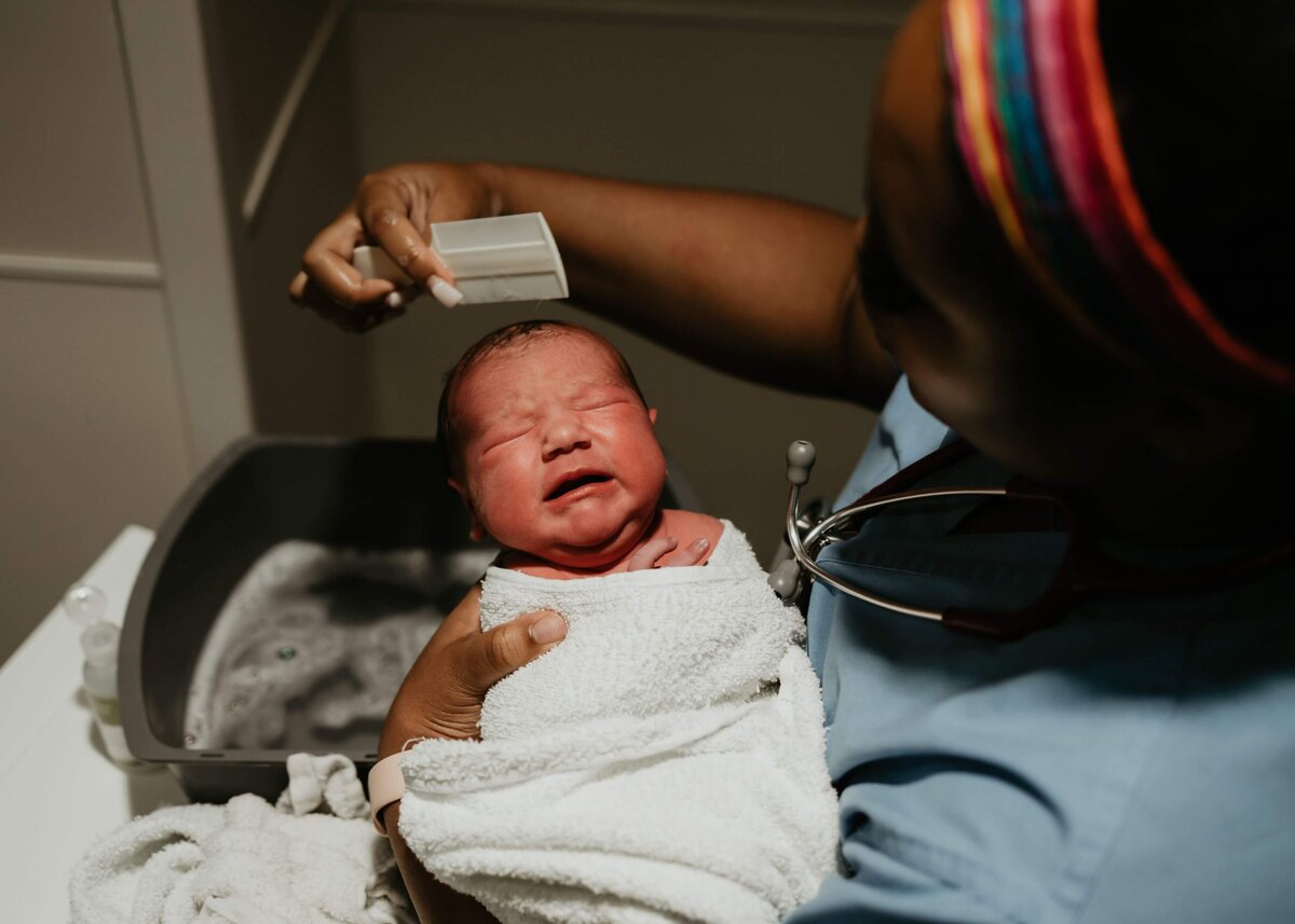 A nurse give a baby her first bath  at Magee Women's Hospital in Pittsburgh