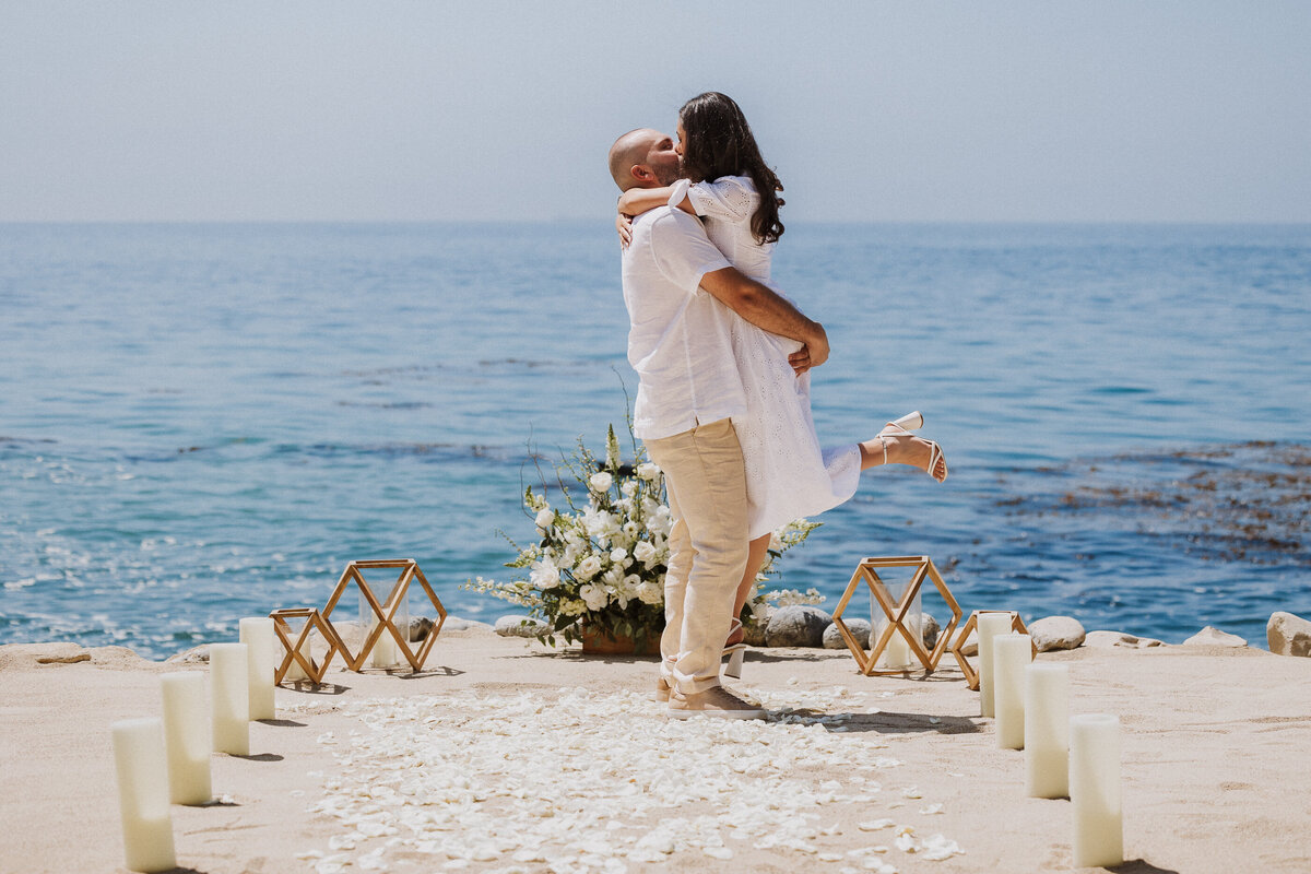 Palos Verdes engagement photographer, beach proposal, white rose petals with candles.