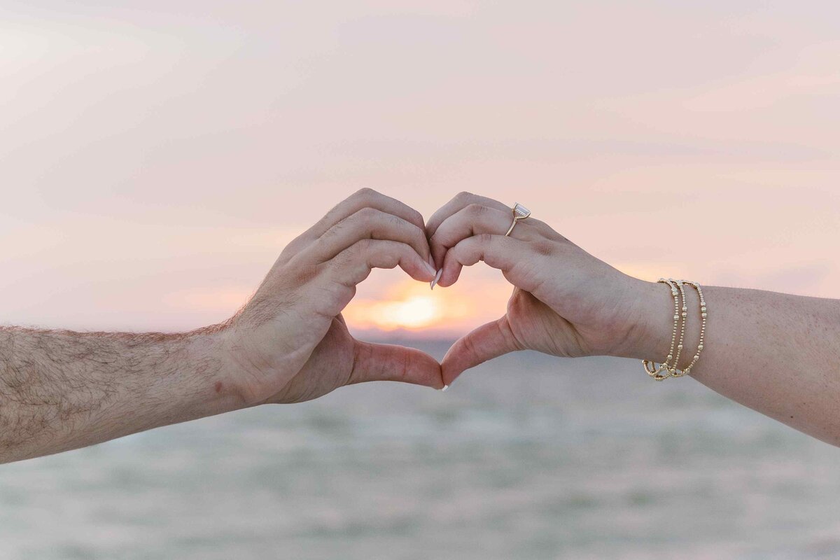 27-hand-heart-sunset