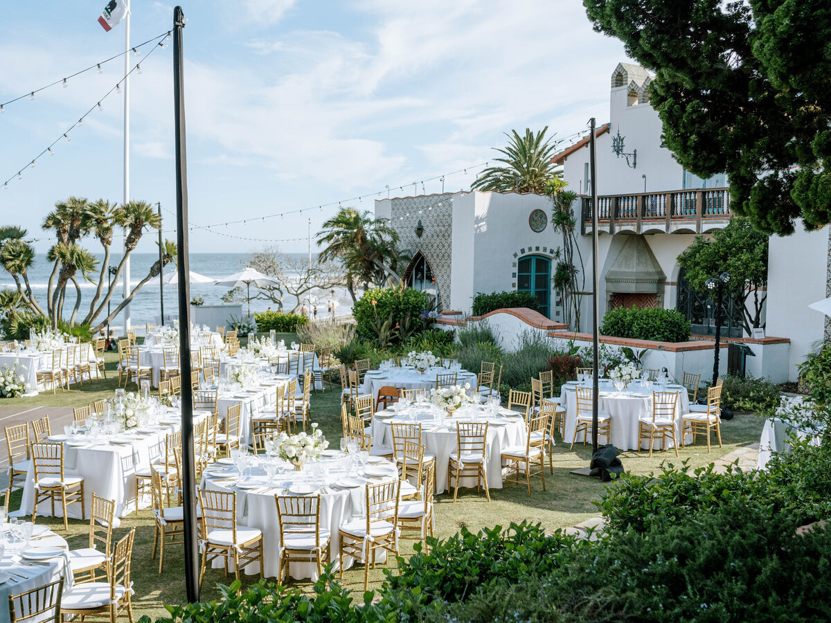 The ever beautiful Historic Adamson House decorated for Lily & Mitchel's wedding and reception. You can see bouquets of flowers by Primrose & Petals everywhere.