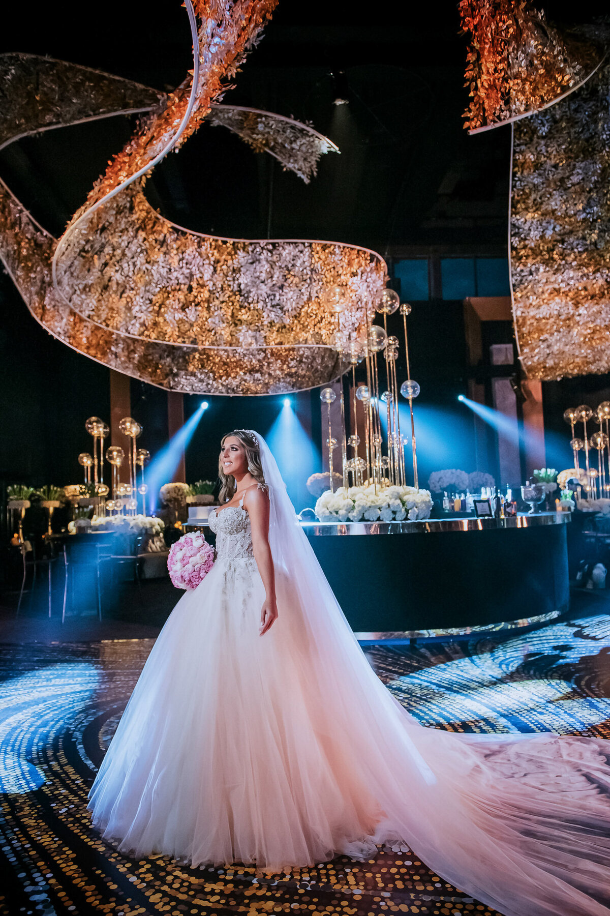 bride-in-spotlight-under-artistic-ceiling-photo-by-ruben-parra-miami-florida