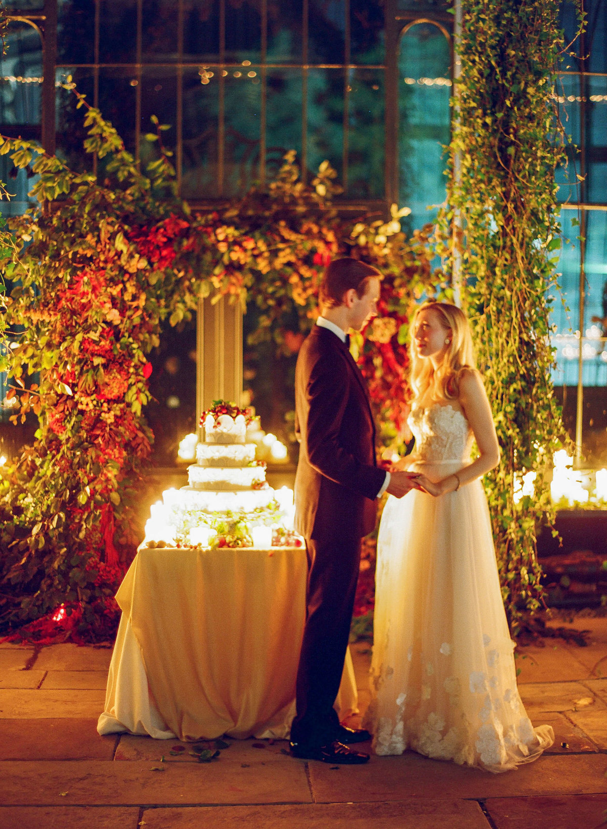 75-KTMerry-weddings-candlelit-cake-bride-groom-Ireland