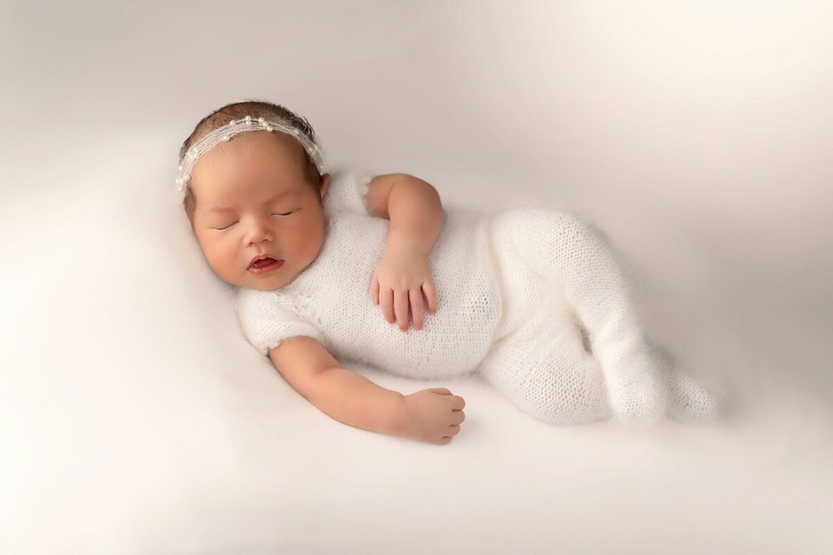 White newborn outfit for photoshoot