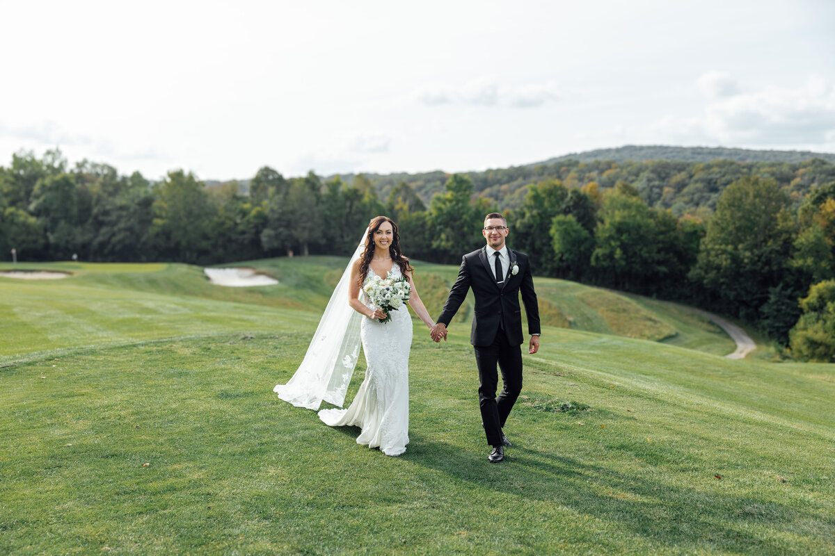Crystal Springs Resort | Bride and groom walking during afternoon wedding | New Jersey