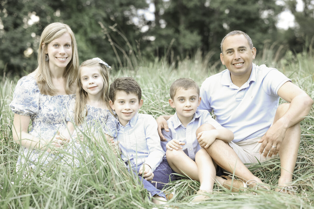 family of five in an outdoor location