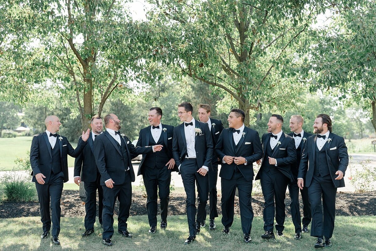 groom walking with his groomsmen at the Pinnacle