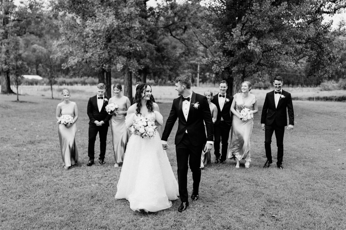 Capture timeless memories with friends in a joyous wedding photoshoot.