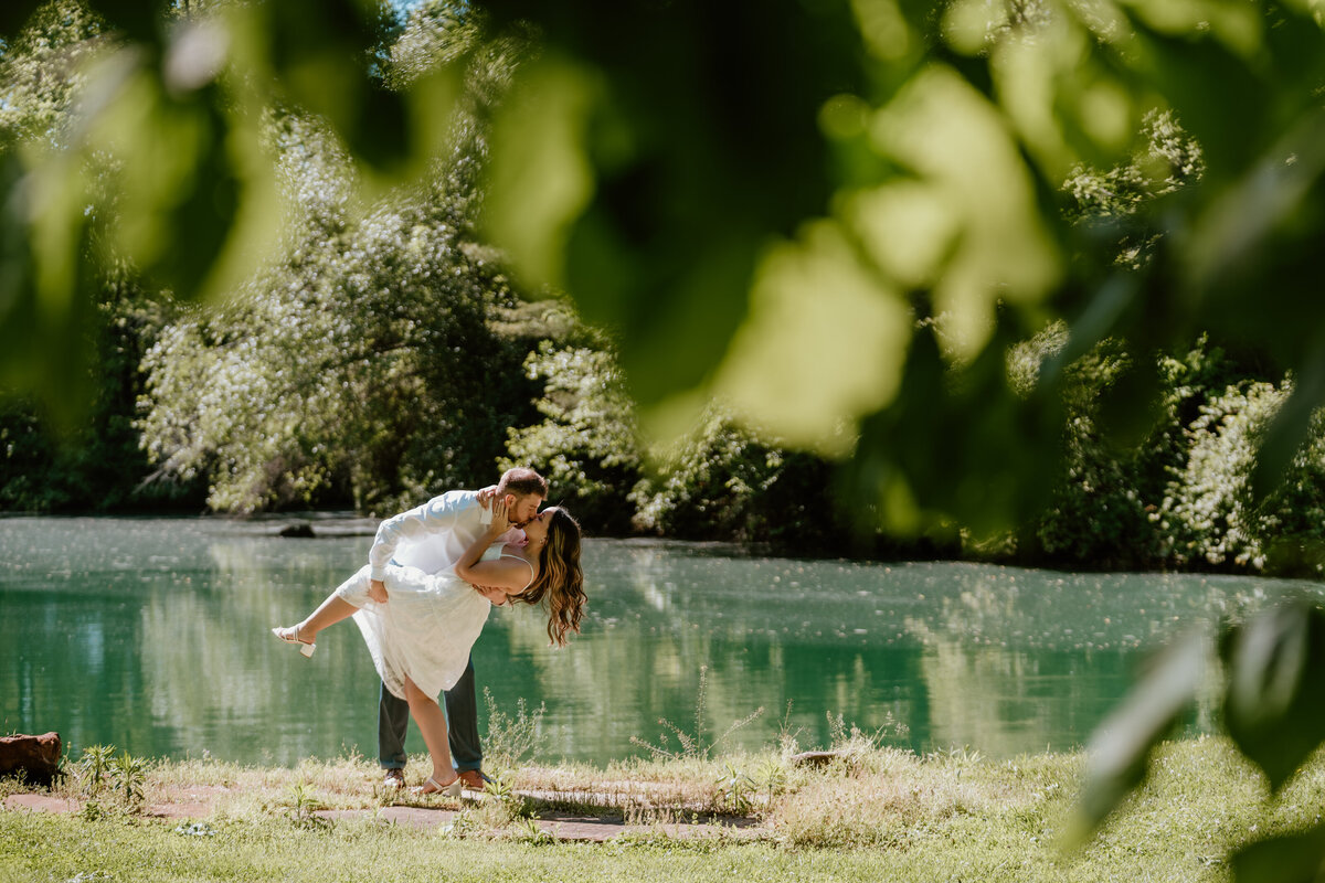 Married couple climbing up a hill