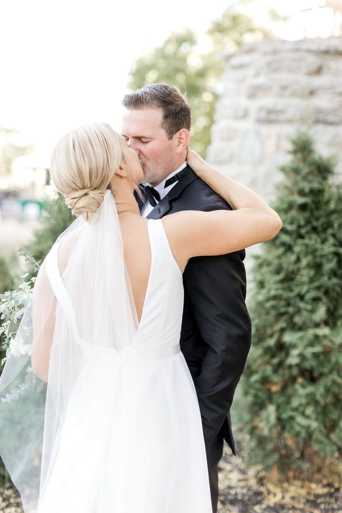 Bride and groom kissing at Minnesota wedding.