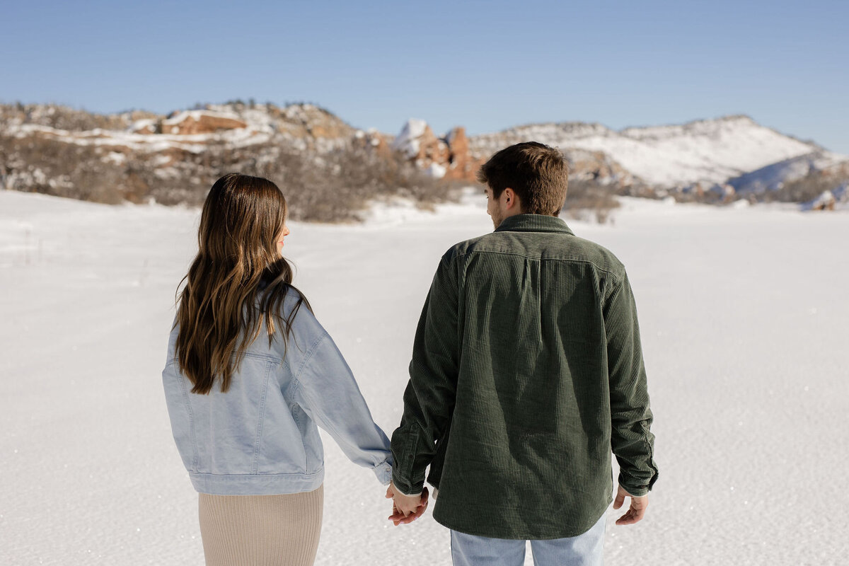 Couple walking in Denver snow