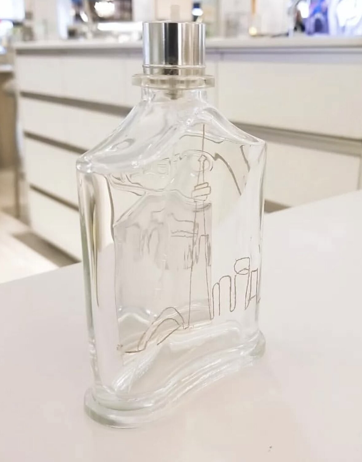 Toronto skyline engraved on Creed luxury fragrance bottle, bespoke artwork by live engraver Jenny Zhang