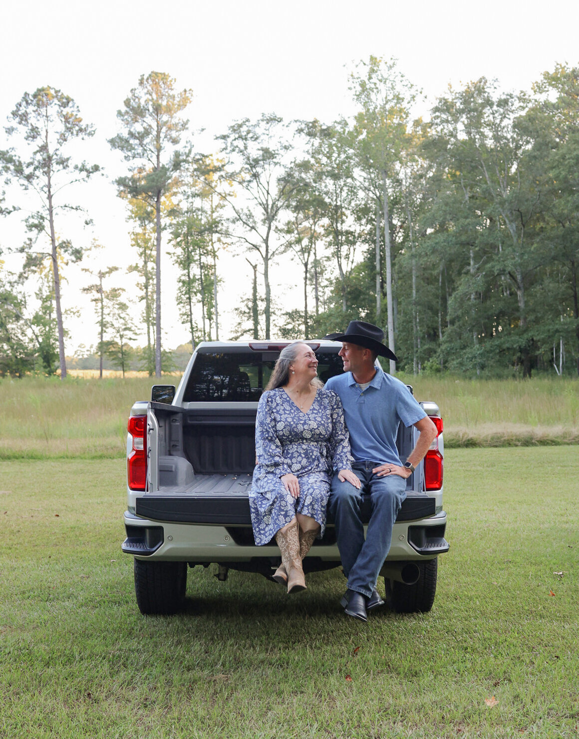 engaged-couple-sitting-in-truck-in-Georgia-by-Amanda-Richardson-Photography