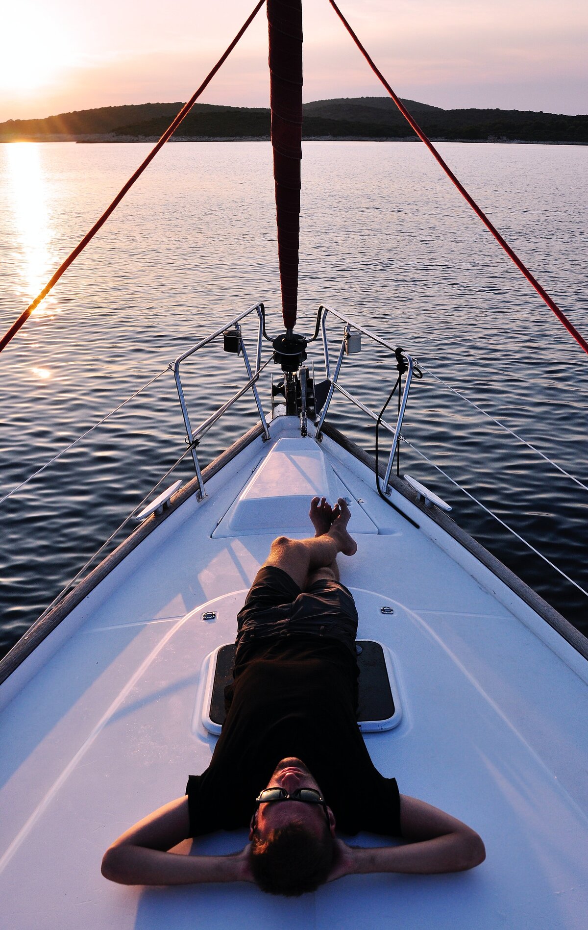 sailing islander relax on bow