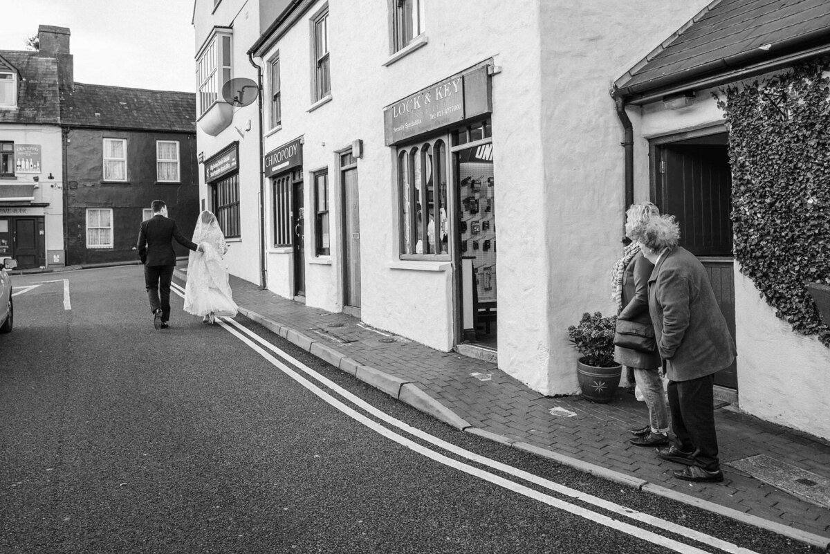119 kinsale-bride-and-groom-walk-street