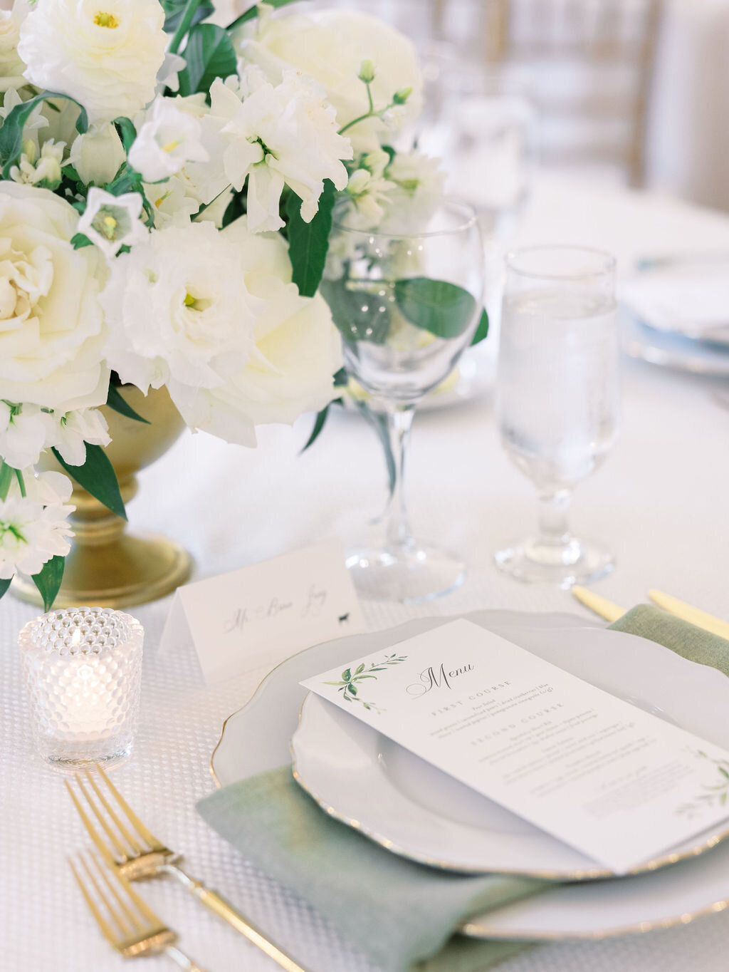 Classic green, white, and gold wedding design at DAR.