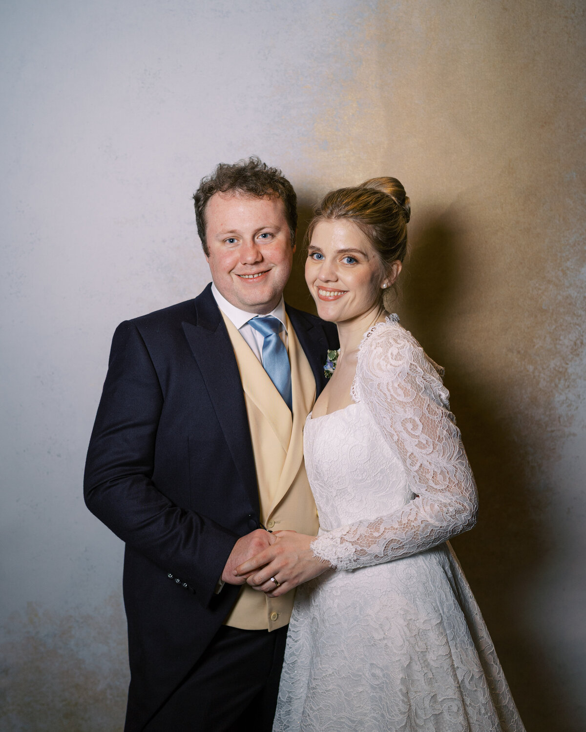 Bride and groom in wedding portrait studio wedding photobooth