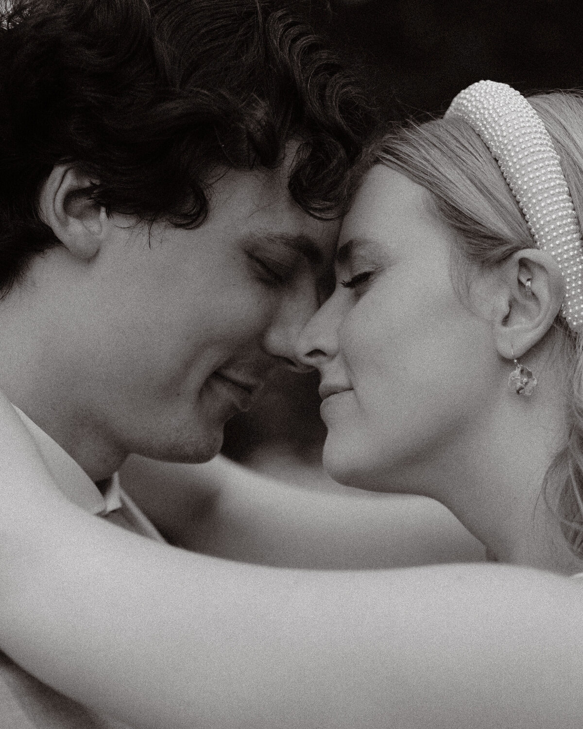 intimate moment between newlyweds hugging