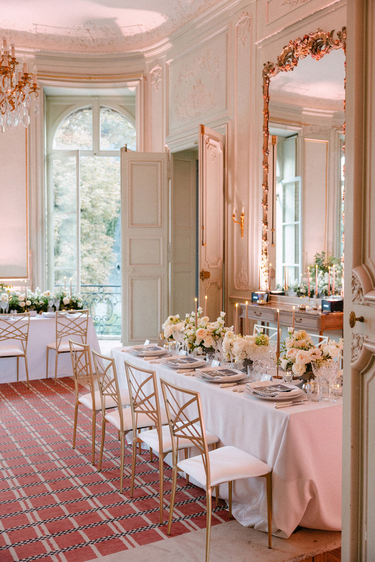 Reception decoration with candles & white florals.