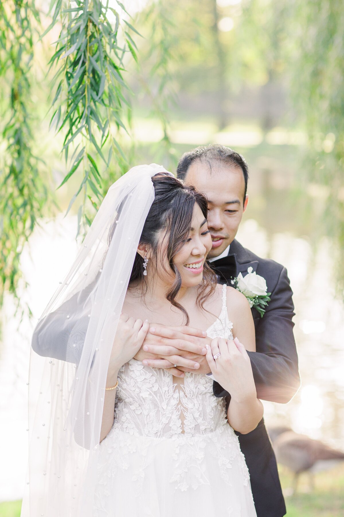 Groom hugging bride representing beautiful Boston wedding pictures