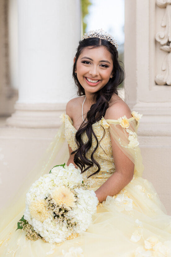 portrait-girl-sitting-quinceanera-yellow-dress