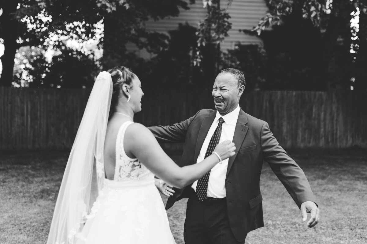emotional first look with Father of the bride